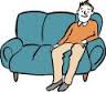 Mensch sitzt auf Couch